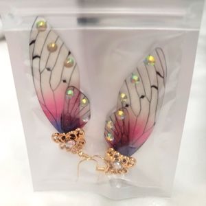 New angel wing earrings. 2.5” long